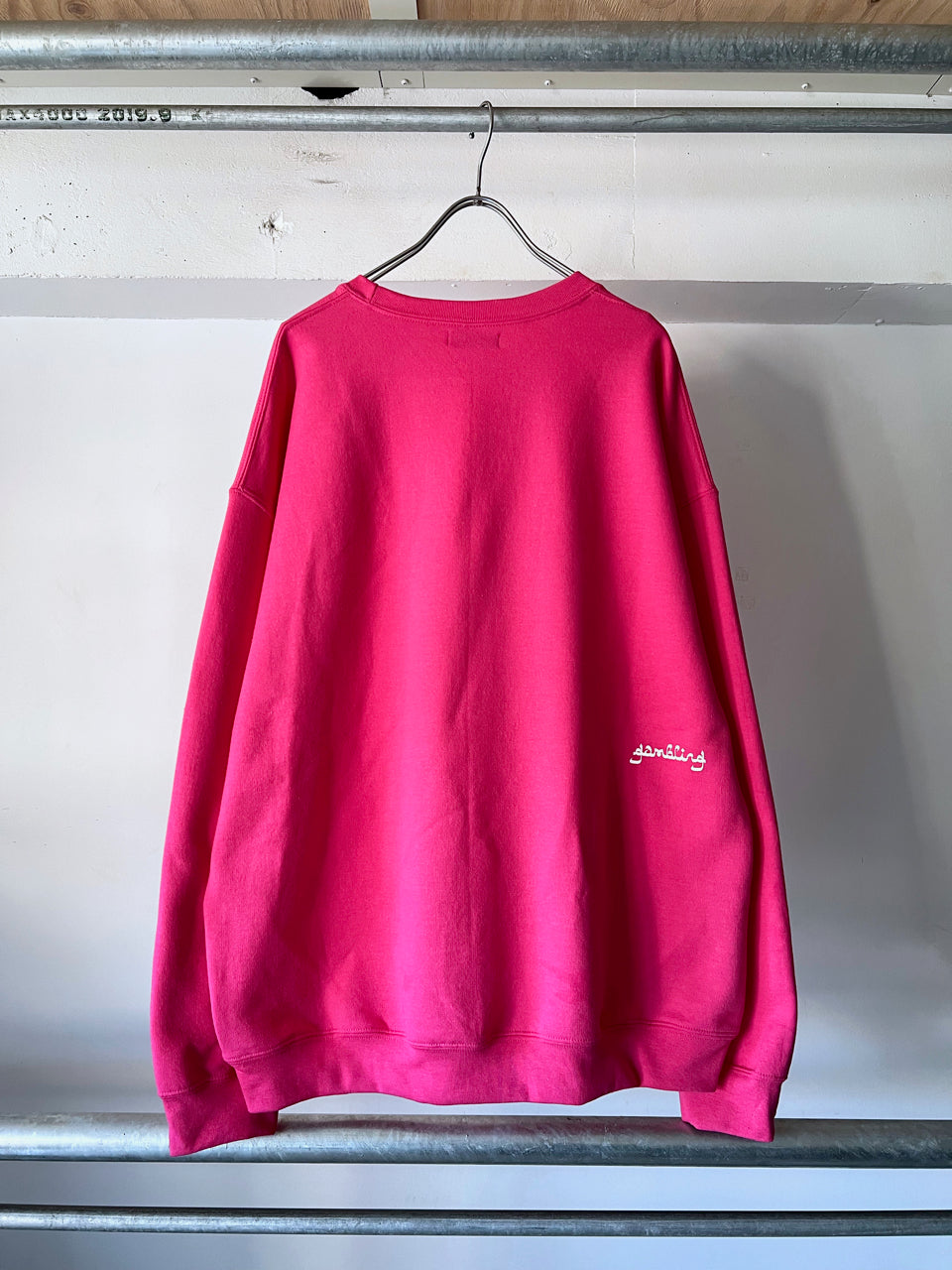 GAMBLING EDUCATION VICTIM CREWNECK SWEATSHIRT PNK