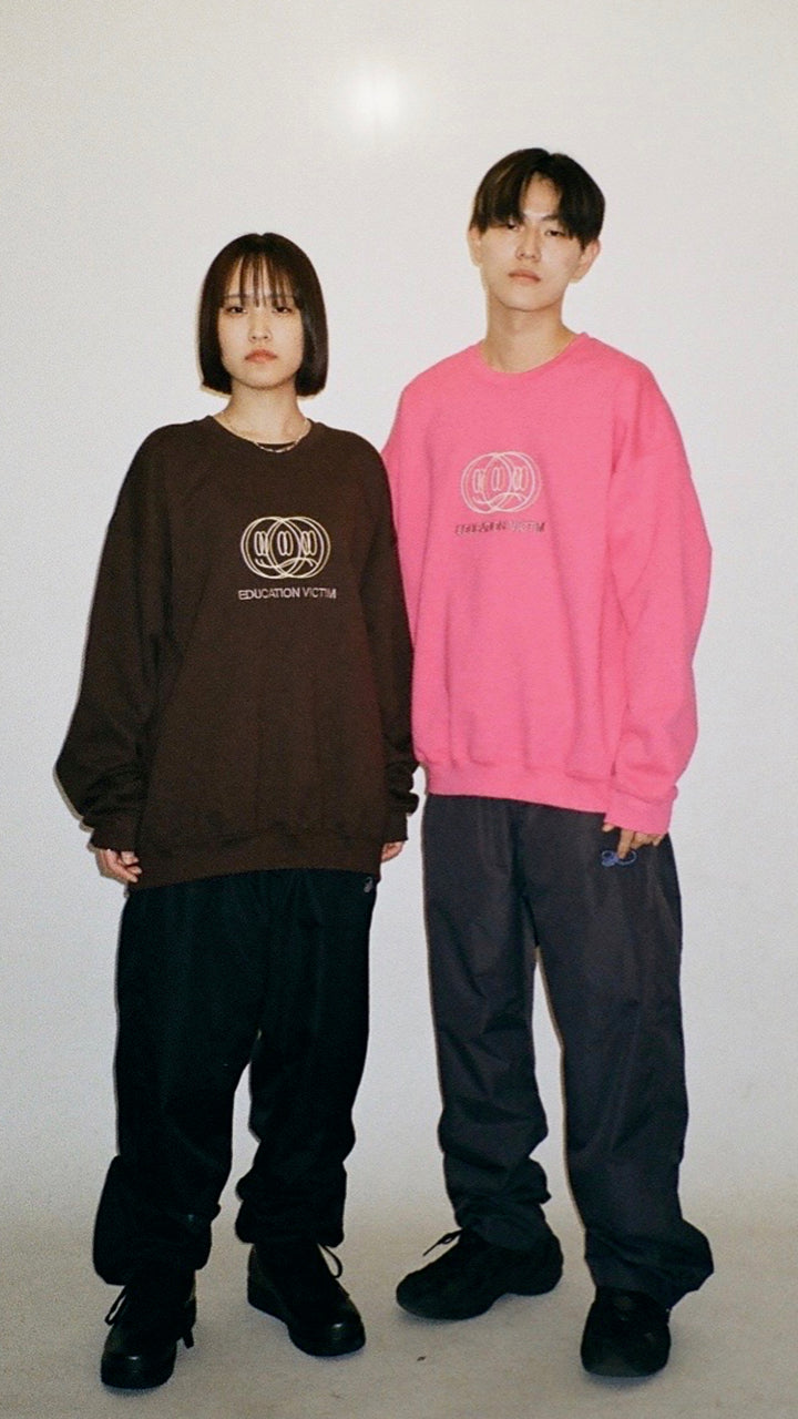 GAMBLING EDUCATION VICTIM CREWNECK SWEATSHIRT PNK