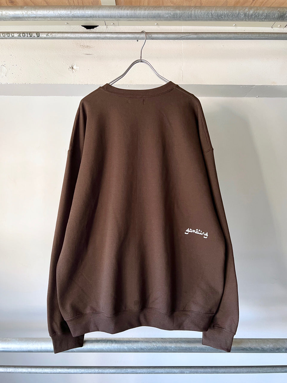 GAMBLING EDUCATION VICTIM CREWNECK SWEATSHIRT BRN