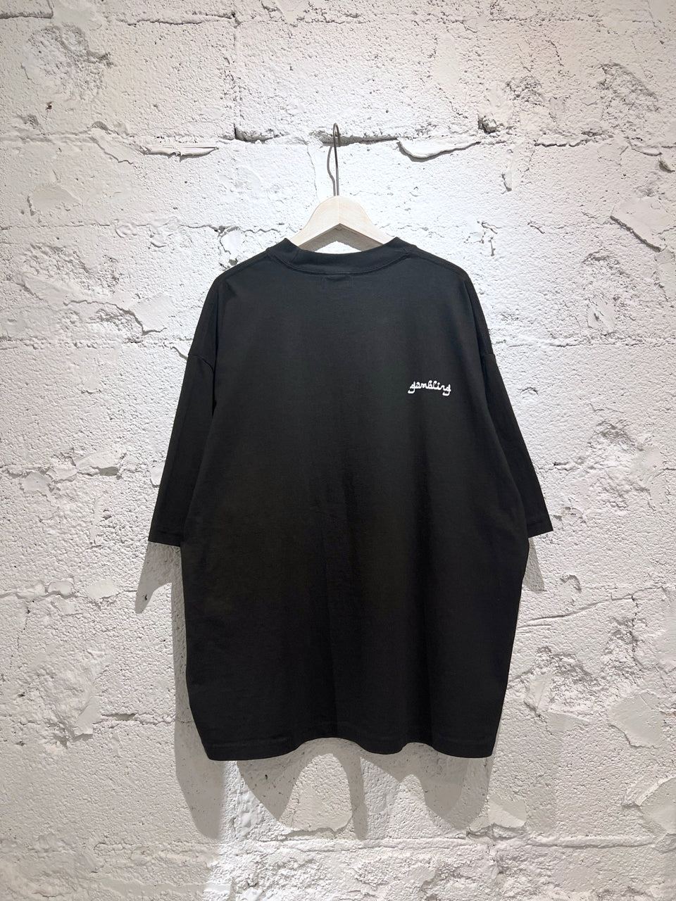 GAMBLING Numbered Four Tee