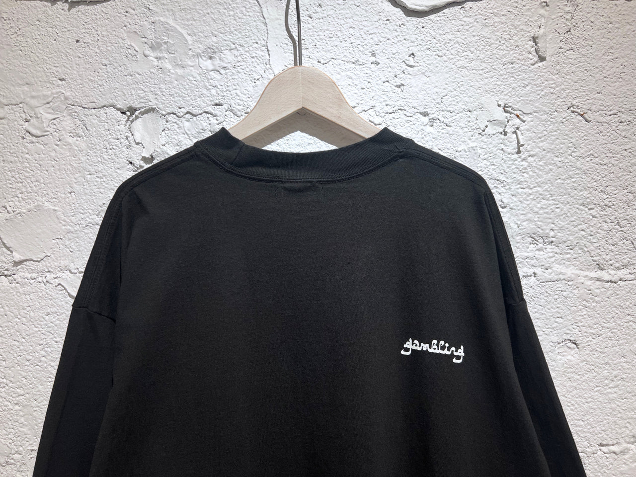 GAMBLING Numbered Four Tee
