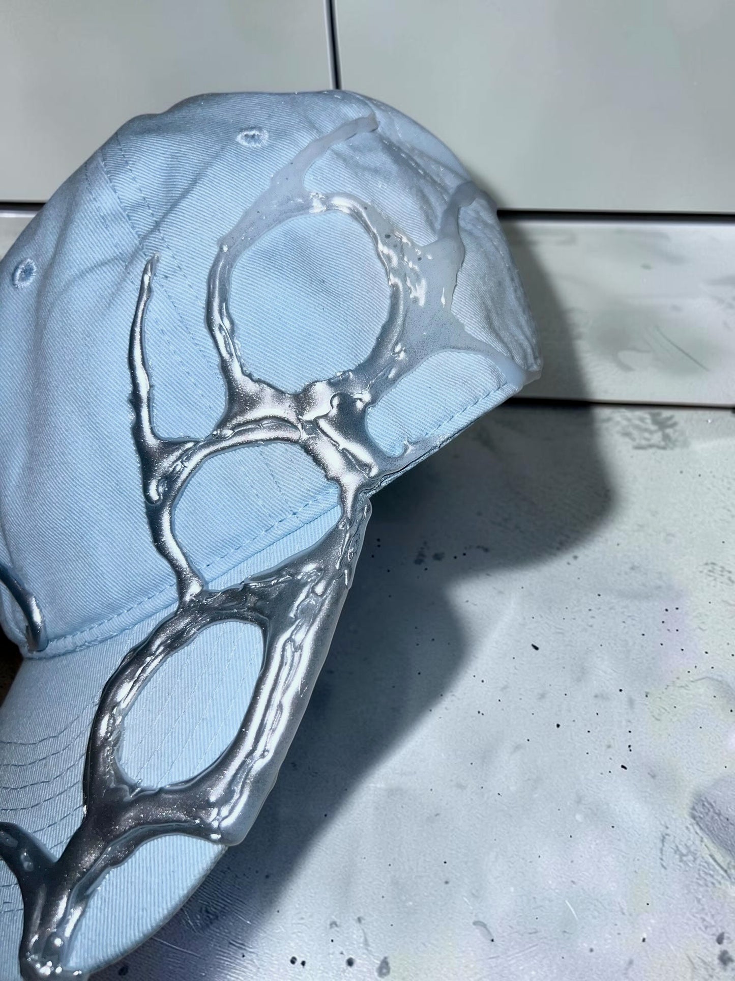 AIM × BAU Liquid Chrome Cap
