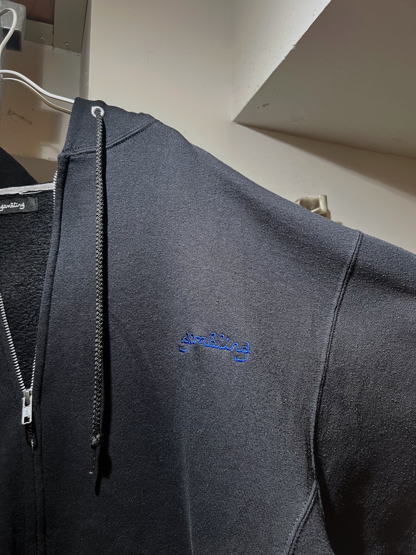 GAMBLING™︎ ZIP THRU HOODIE